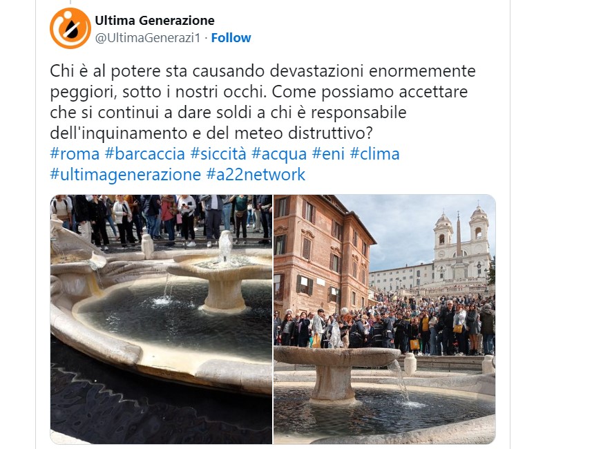 Activists dye black the water of a fountain in Rome in protest against climate change
