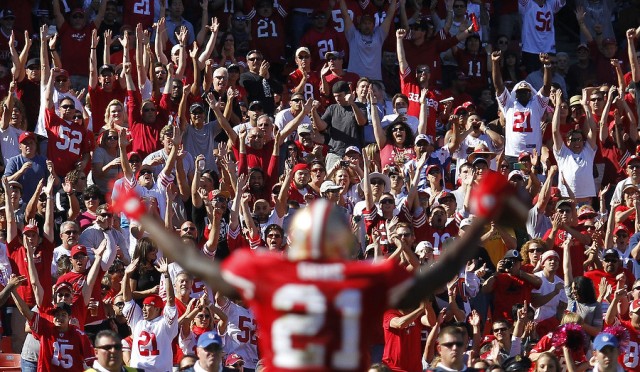 San Francisco 49ers fans cheers as running back Frank Gore (21) celebrates his touchdown (later ruled not a touchdown) during the second quarter of his NFL football game against the Cleveland Browns in San Francisco