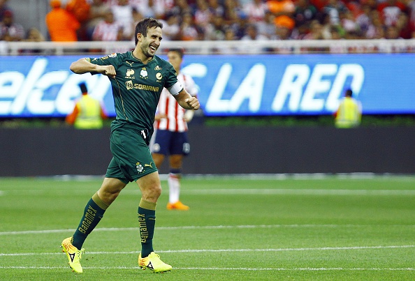 Carlos Izquierdoz of Santos celebrates his team's score during their Mexican Clausura 2015 tournament second leg semifinal football match against Guadalajara at Omnilife stadium on May 24,2015 in Guadalajara. AFP PHOTO/HECTOR GUERRERO        (Photo credit should read HECTOR GUERRERO/AFP/Getty Images)