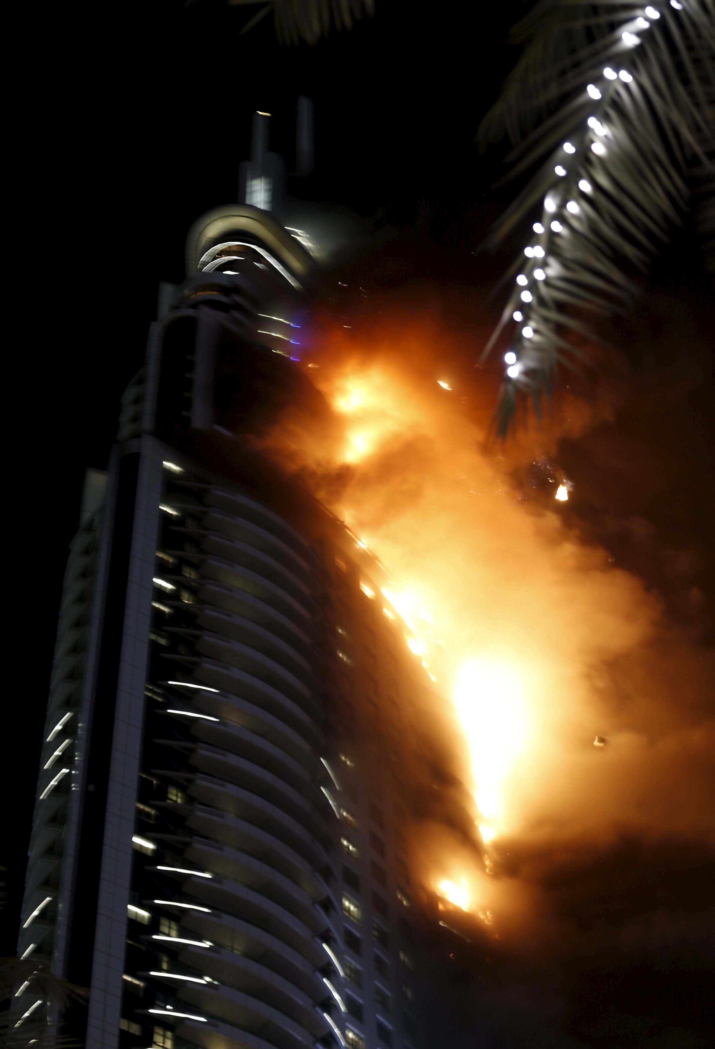 A fire engulfs The Address Hotel in downtown Dubai in the United Arab Emirates December 31, 2015. REUTERS/Ahmed Jadallah