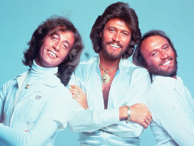 Bee gees more than a woman. Би джиз фото группы. Bee Gees арт. Bee Gees Stayin Alive Мадагаскар.