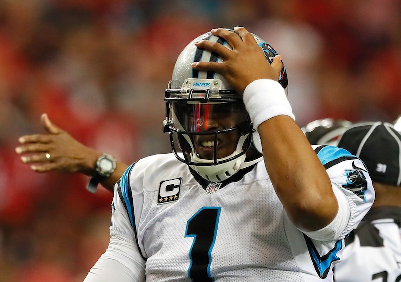 Cam Newton dolor cabeza