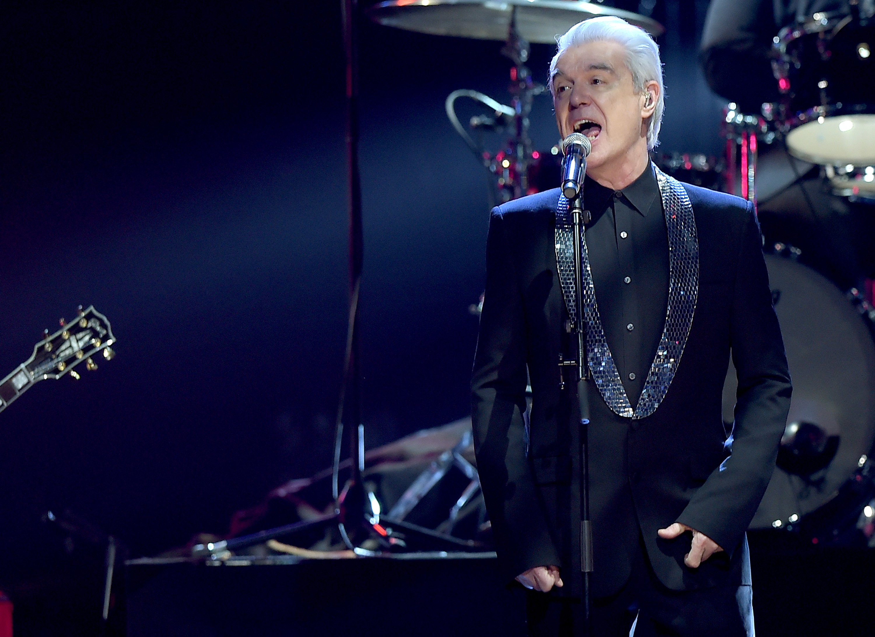 NEW YORK, NEW YORK - APRIL 08: David Byrne performs at the 31st Annual Rock And Roll Hall Of Fame Induction Ceremony at Barclays Center on April 8, 2016 in New York City. (Photo by Theo Wargo/Getty Images)