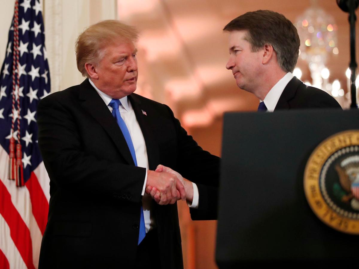 President Donald Trump shakes hands with Judge Brett Kavanaugh his Supreme Court nominee, in the East Room of the White House, Monday, July 9, 2018, in Washington. (0