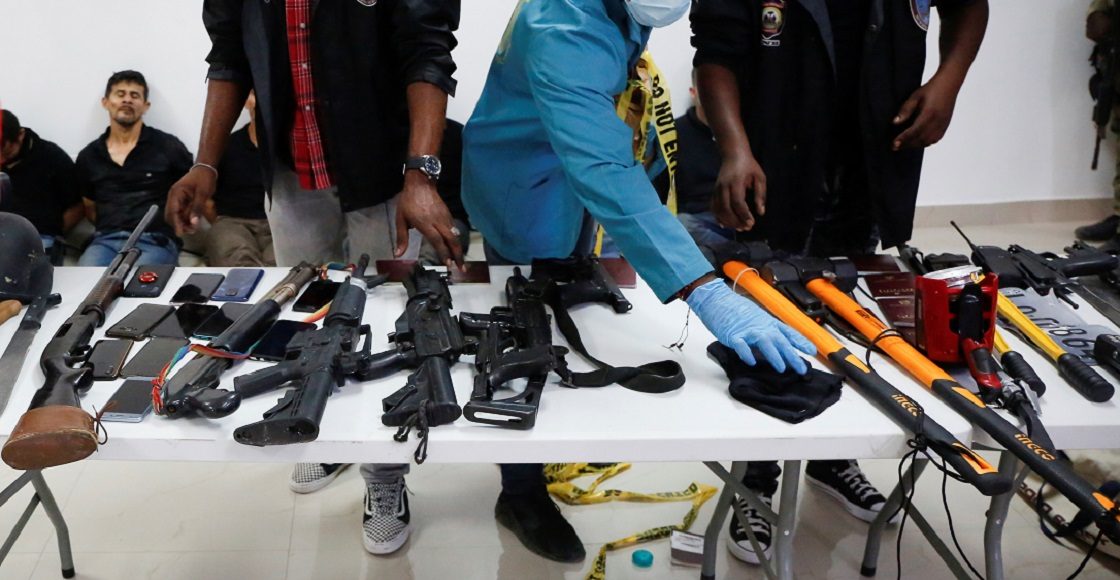 Weaponry, mobile phones, passports and other items are being shown to the media along with suspects in the assassination of President Jovenel Moise, who was shot dead early Wednesday at his home, in Port-au-Prince, Haiti July 8, 2021.